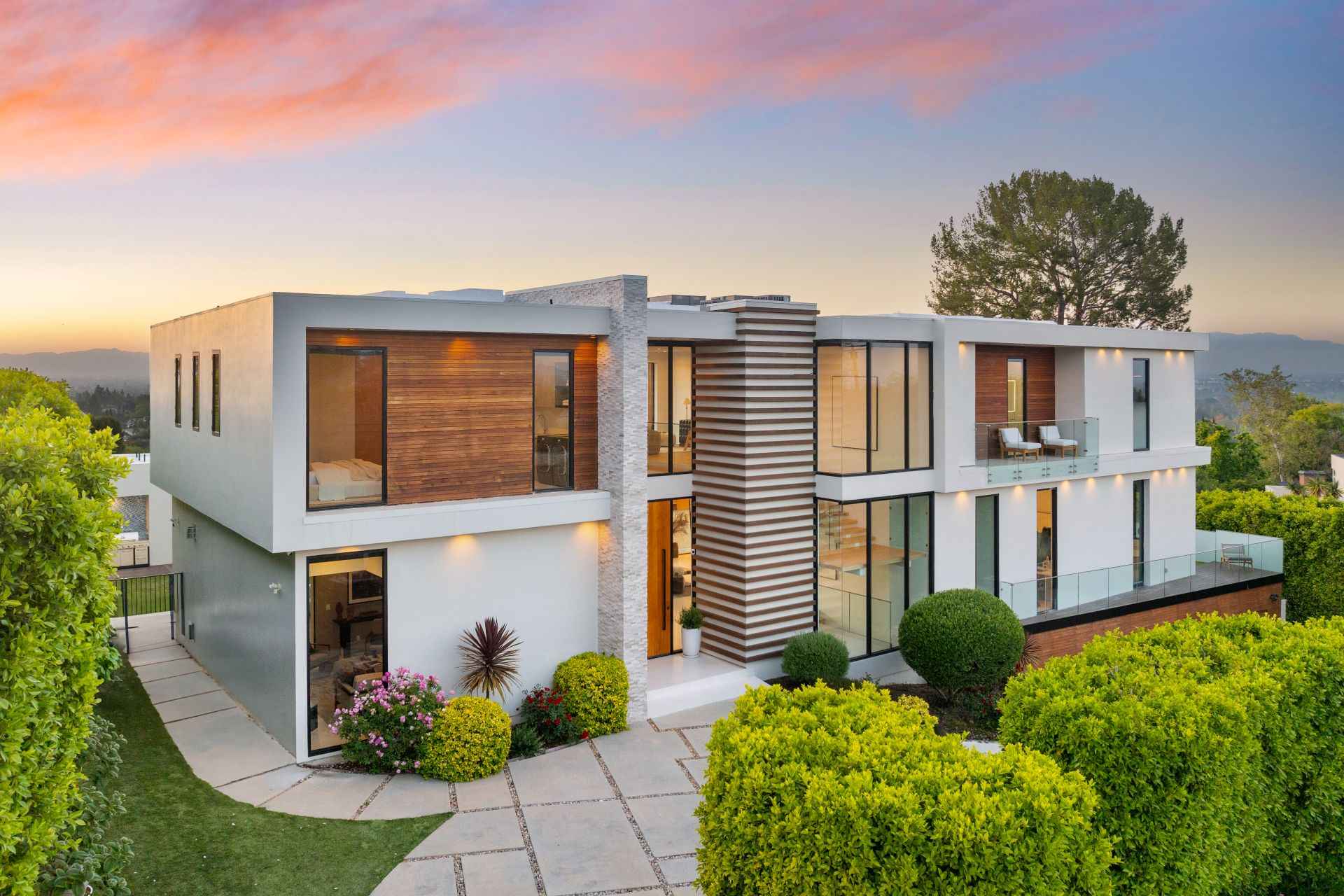 contemporary-two-level-home-on-hillside-with-shrub-2024-06-18-18-49-05-utc_11zon.jpg